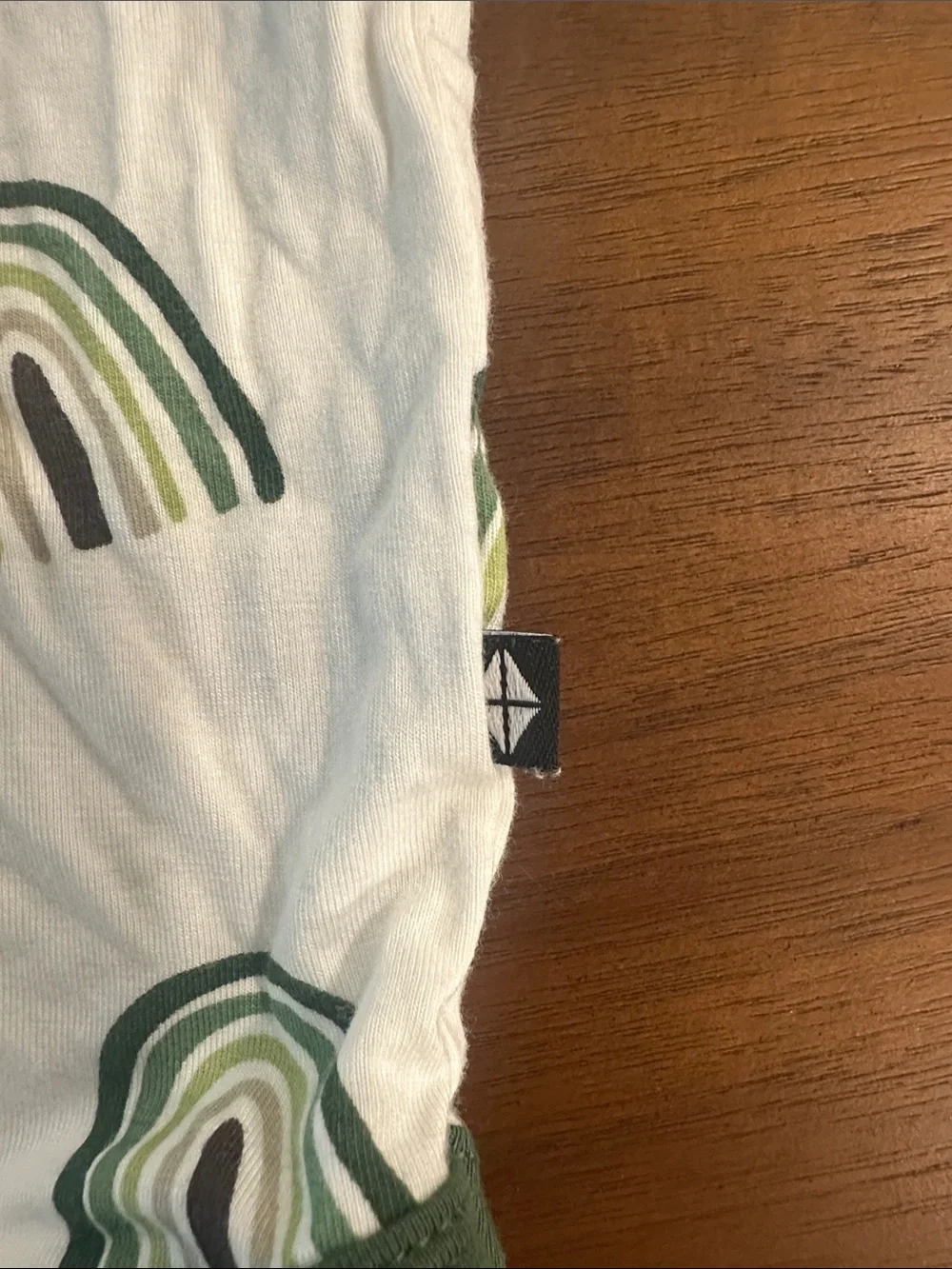 Kyte BABY White Onesie with Green Rainbow Print